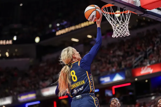 Sophie Cunningham of the Indiana Fever shoots the ball during the first half against the Dallas Wings.