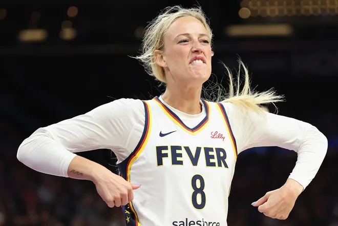 Sophie Cunningham #8 of the Indiana Fever reacts to a 3-point shot.