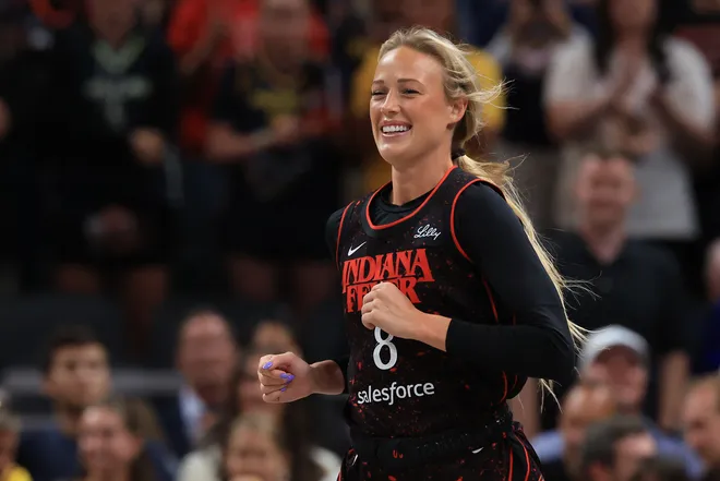 Sophie Cunningham of the Indiana Fever runs onto the court prior to the game against the Dallas Wings at Gainbridge Fieldhouse.