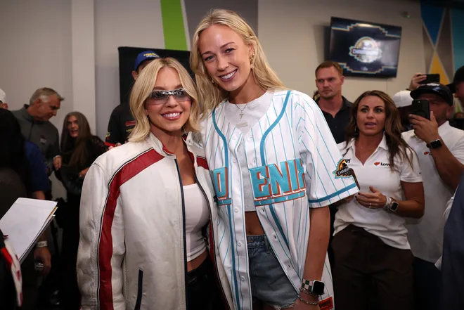 Sydney Sweeney (L) and honorary pace car driver Sophie Cunningham.