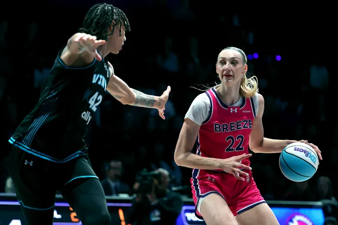 Cameron Brink of the Breeze dribbles the ball against Brittney Griner #42 of the Vinyl.