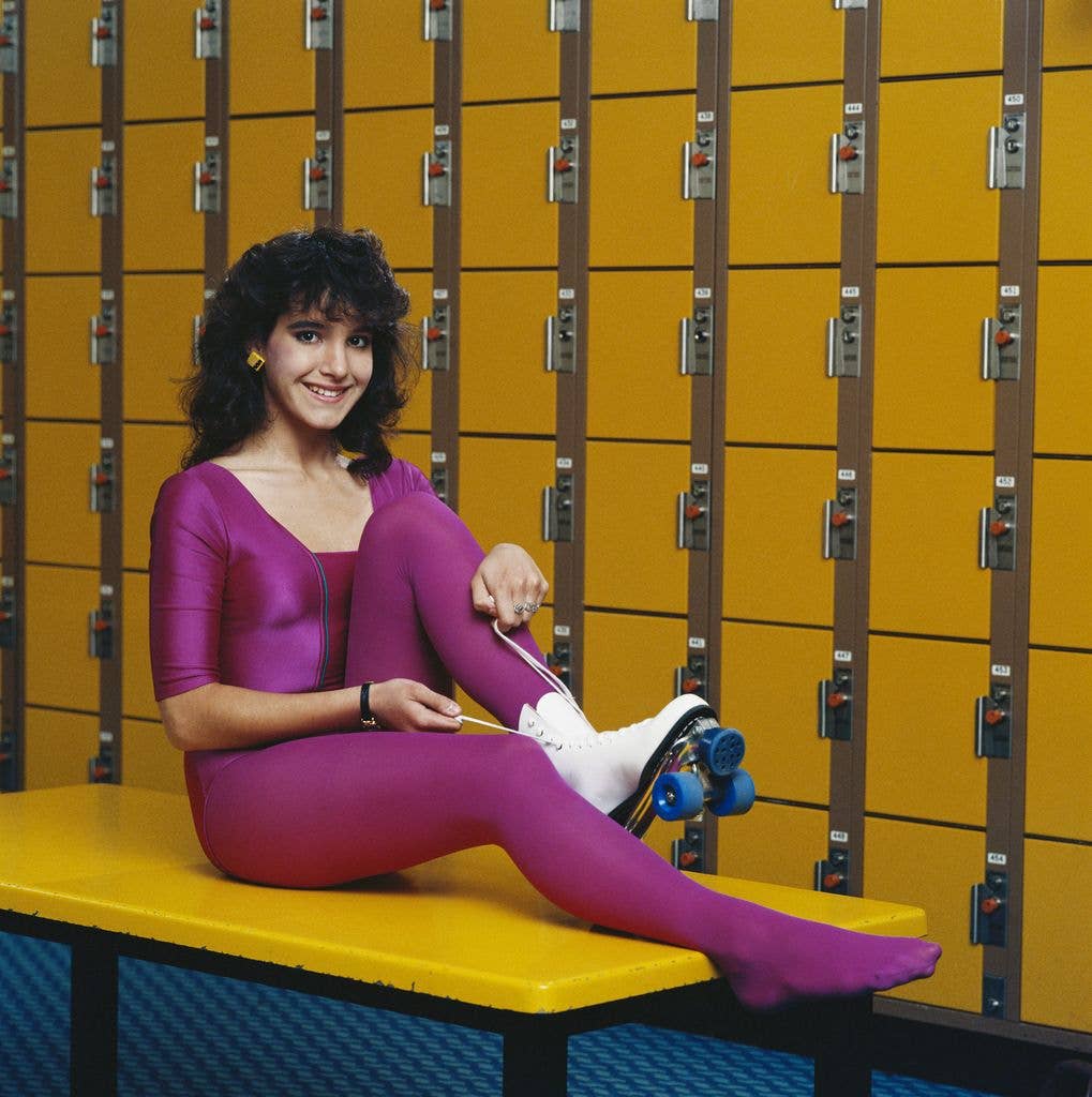 woman in purple workout outfit 