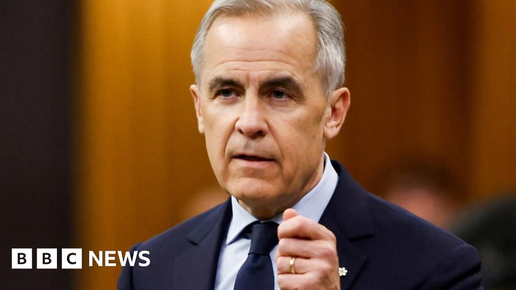 Carney secures Liberal majority government after by-election wins - BBC
