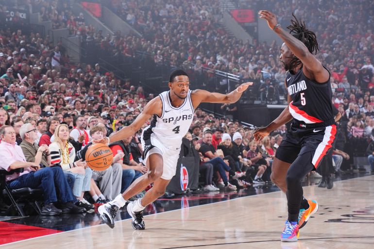 BOSTON, MA - APRIL 26: De'Aaron Fox #4 of the San Antonio Spurs dribbles the ball during the game against the Portland Trail Blazers during Round 1 Game 4 of the 2026 Playoffs on April 26, 2026 at TD Garden in Boston, Massachusetts. NOTE TO USER: User expressly acknowledges and agrees that, by downloading and/or using this Photograph, user is consenting to the terms and conditions of the Getty Images License Agreement. Mandatory Copyright Notice: Copyright 2026 NBAE Brian Babineau/NBAE via Getty Images/AFP (Photo by Brian Babineau / NBAE / Getty Images / Getty Images via AFP)