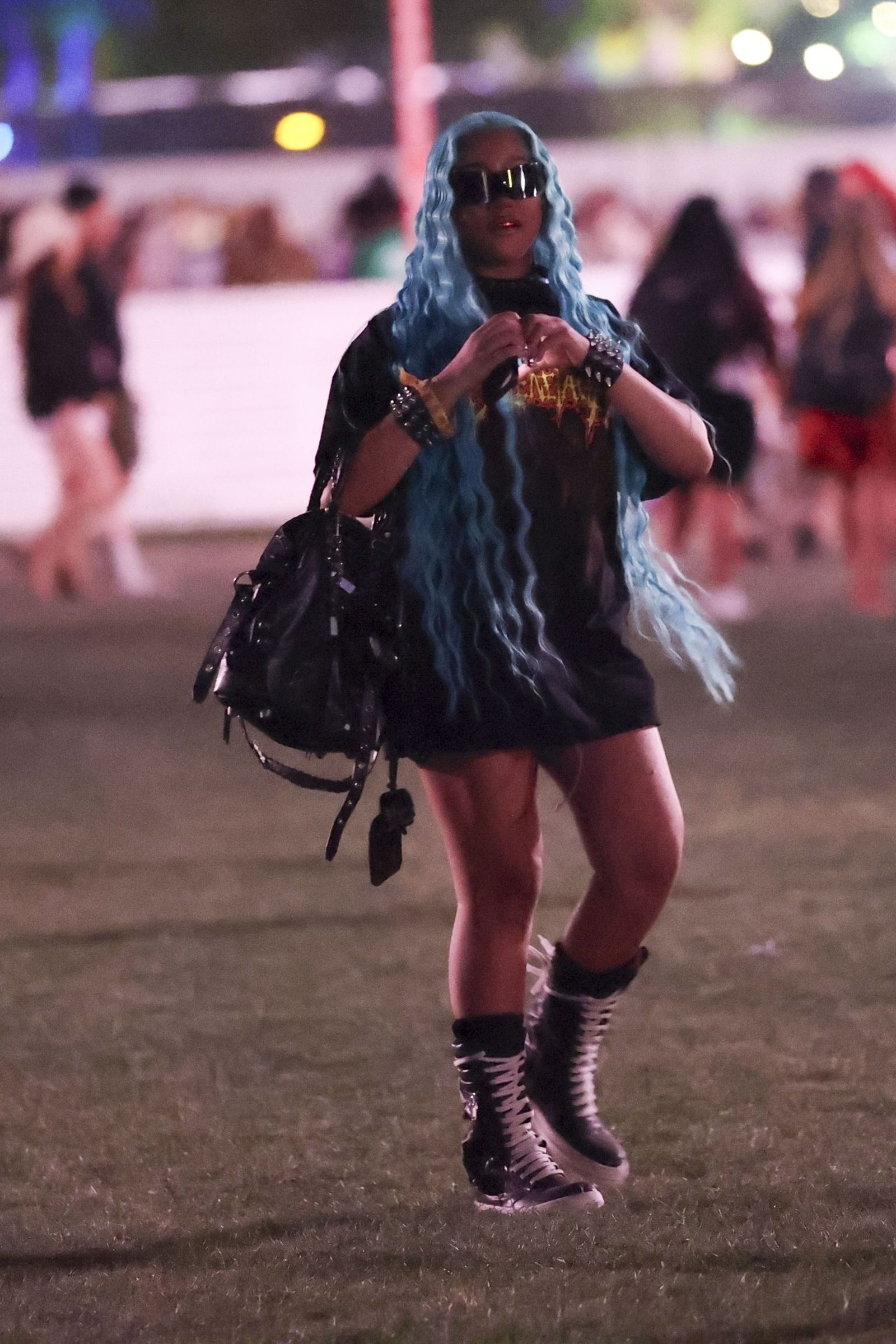 North West is seen attending and enjoying Justin Biebers performance on day two of weekend one at the 2026 Coachella...