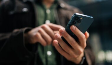 Close-up of a phone being used by a man