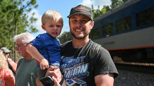 Blake Wade, and his son, Hayes, 2, rode the Rockingham Special from Raleigh to attend the NASCAR races at Rockingham Speedway on Saturday, April 4, 2026.