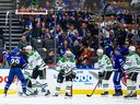 Toronto Maple Leafs right wing William Nylander (88) and centre John Tavares (91) celebrate a goal in front of the Dallas Stars net during first period in Toronto on Monday.


