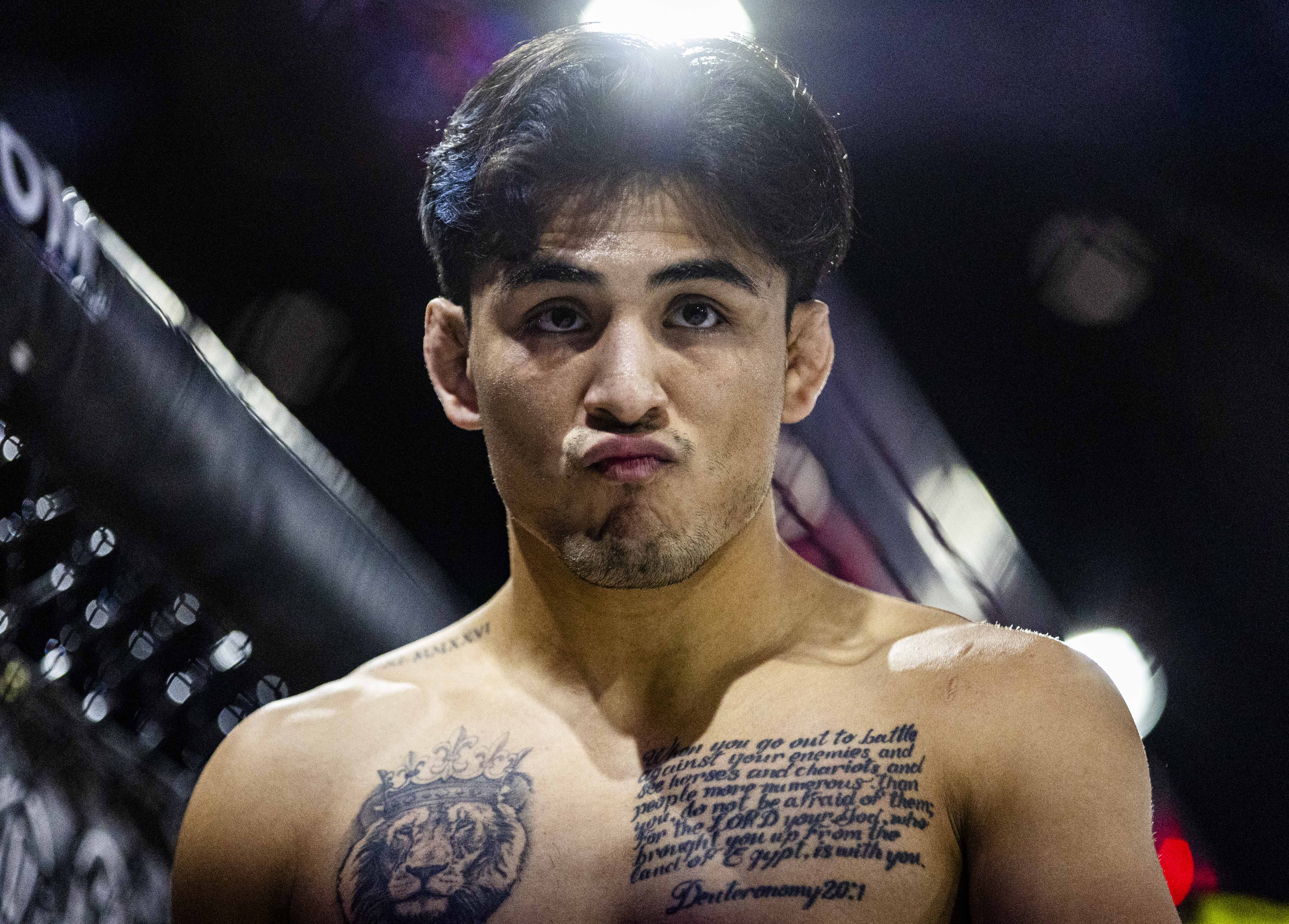 Andrew Alirez paces the octagon before the start of his...