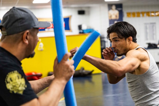 Andrew Alirez practices for his upcoming MMA fight with his uncle, a former MMA fighter, Mike Alirez, in the wrestling room in the Butler-Hancock Athletics Center on the campus of the University of Northern Colorado in Greeley on Friday, March 20, 2026. (Brice Tucker/Staff Photographer)