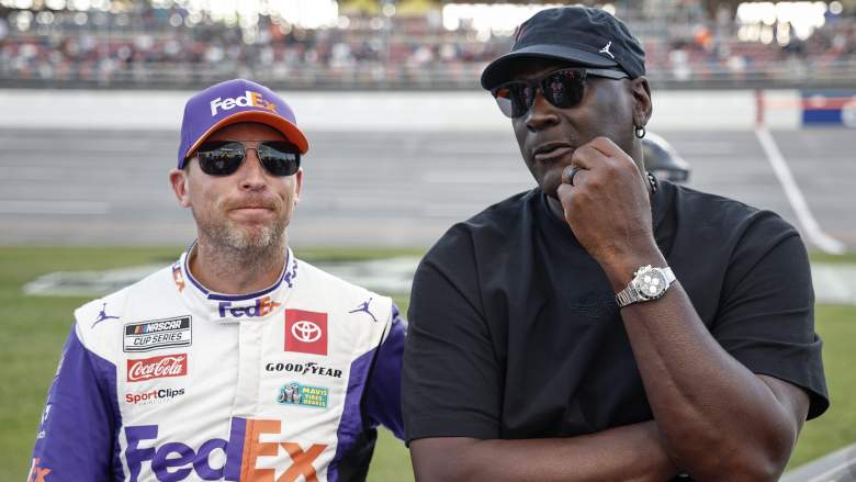 Denny Hamlin stands next to Michael Jordan on the grid before NASCAR Cup Series race at Talladega Superspeedway