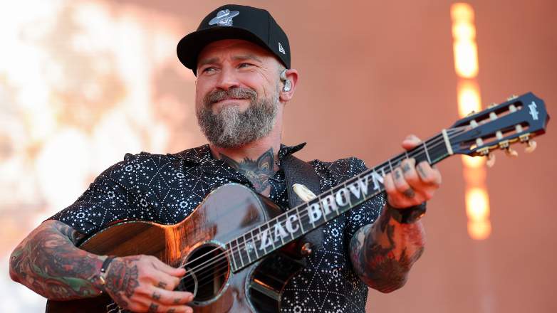 Zac Brown performs on stage during a live concert appearance