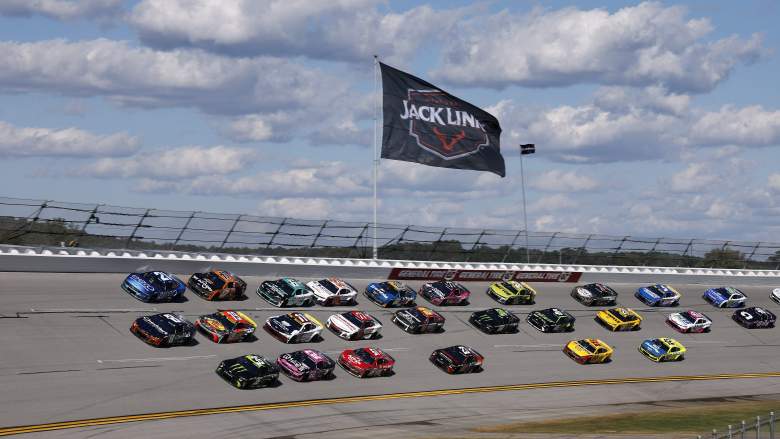 NASCAR Cup Series cars race in a tight pack at Talladega Superspeedway beneath a Jack Link’s 500 banner