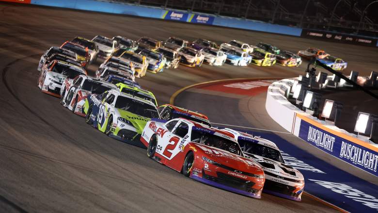 O’Reilly Series cars race tightly packed during a NASCAR event at Phoenix Raceway