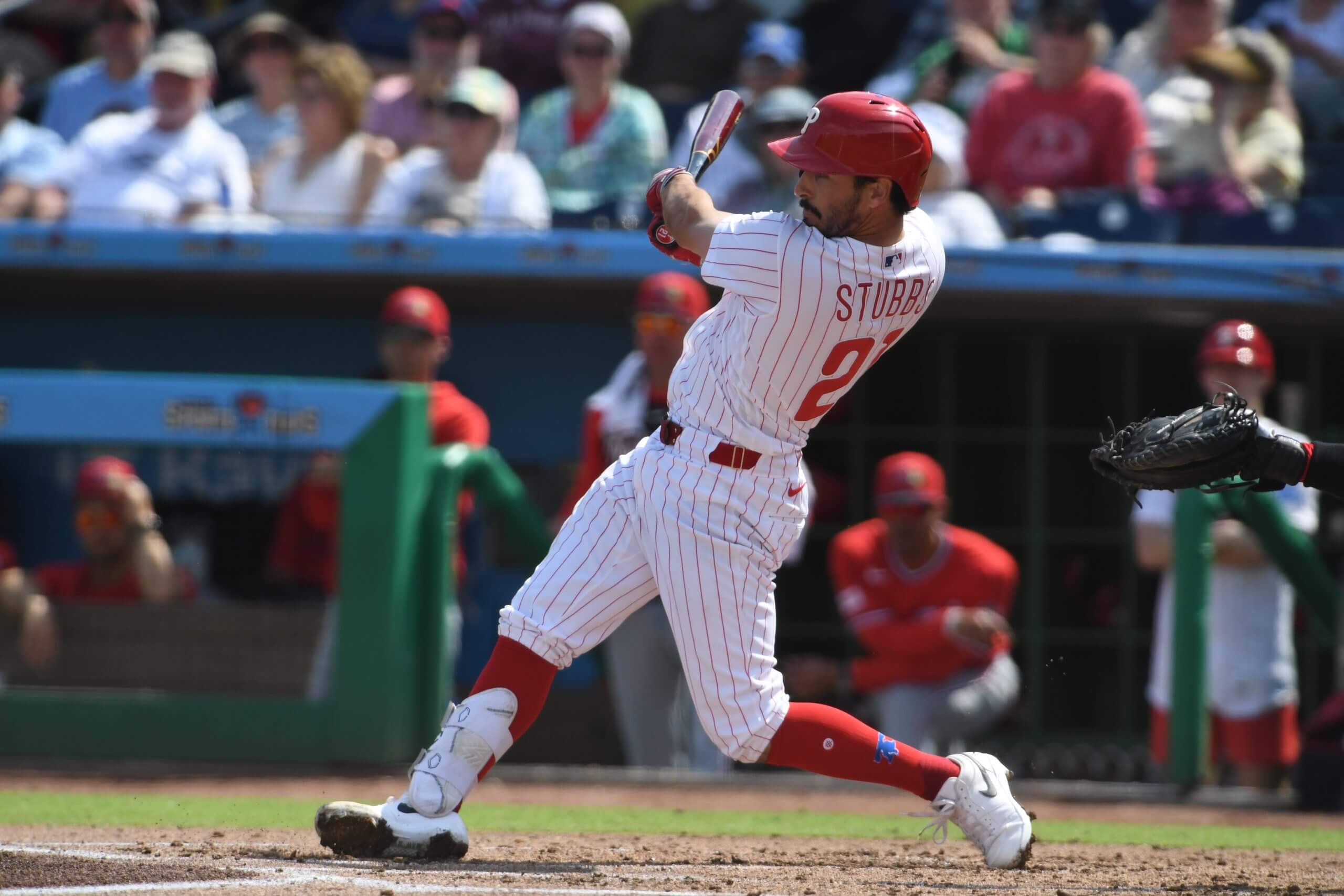 Garrett Stubbs swings during a spring training game against the Nationals.