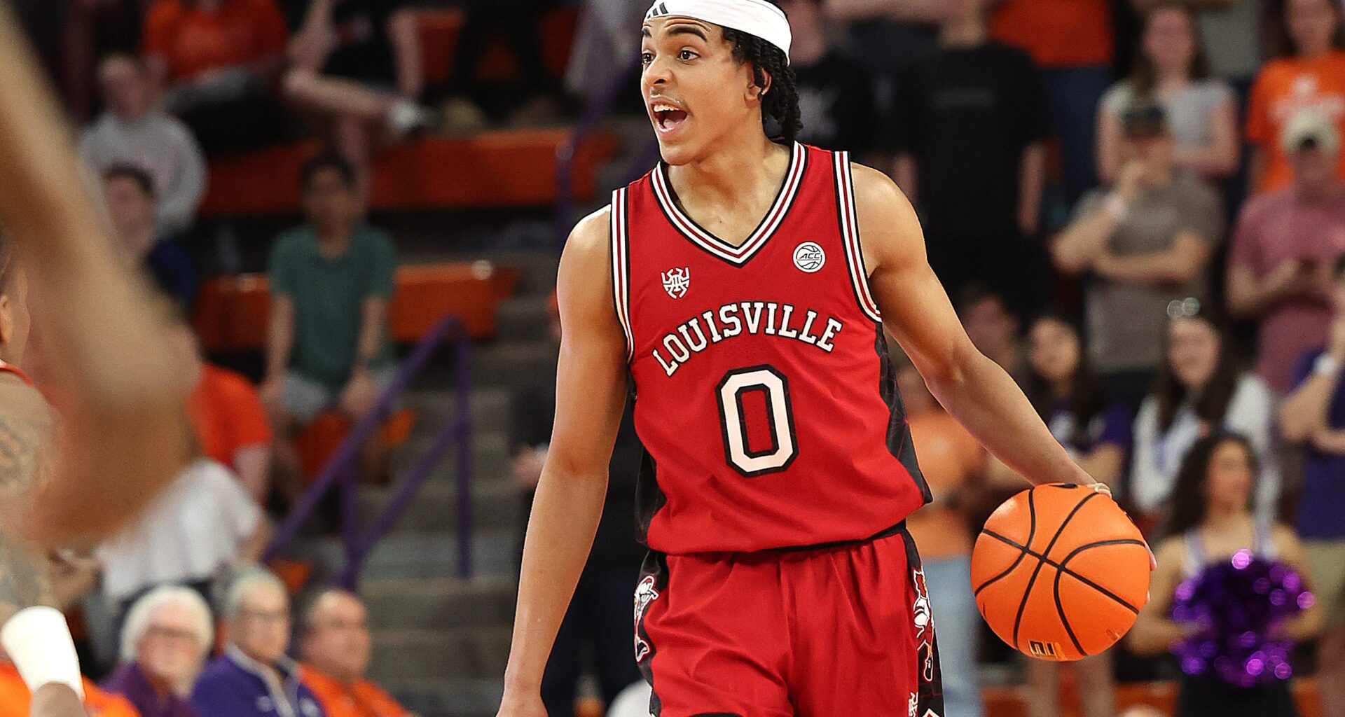 Mikel Brown Jr. brings the ball up the court.