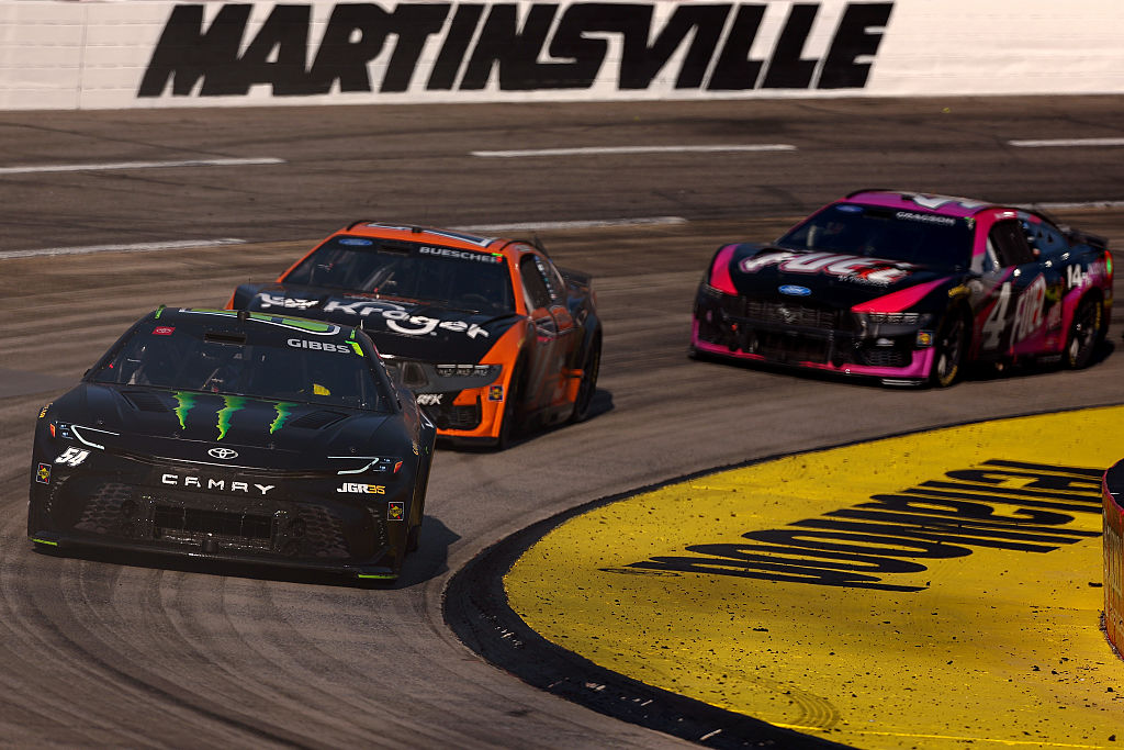 MARTINSVILLE, VIRGINIA - MARCH 29: Ty Gibbs, driver of the #54 Monster Energy Toyota, Chris Buescher, driver of the #17 Kroger/Thomas' High Protein Ford, and Noah Gragson, driver of the #4 FUEL by Franzia Ford, race during the NASCAR Cup Series Cook Out 400 at Martinsville Speedway on March 29, 2026 in Martinsville, Virginia. (Photo by David Jensen/Getty Images)