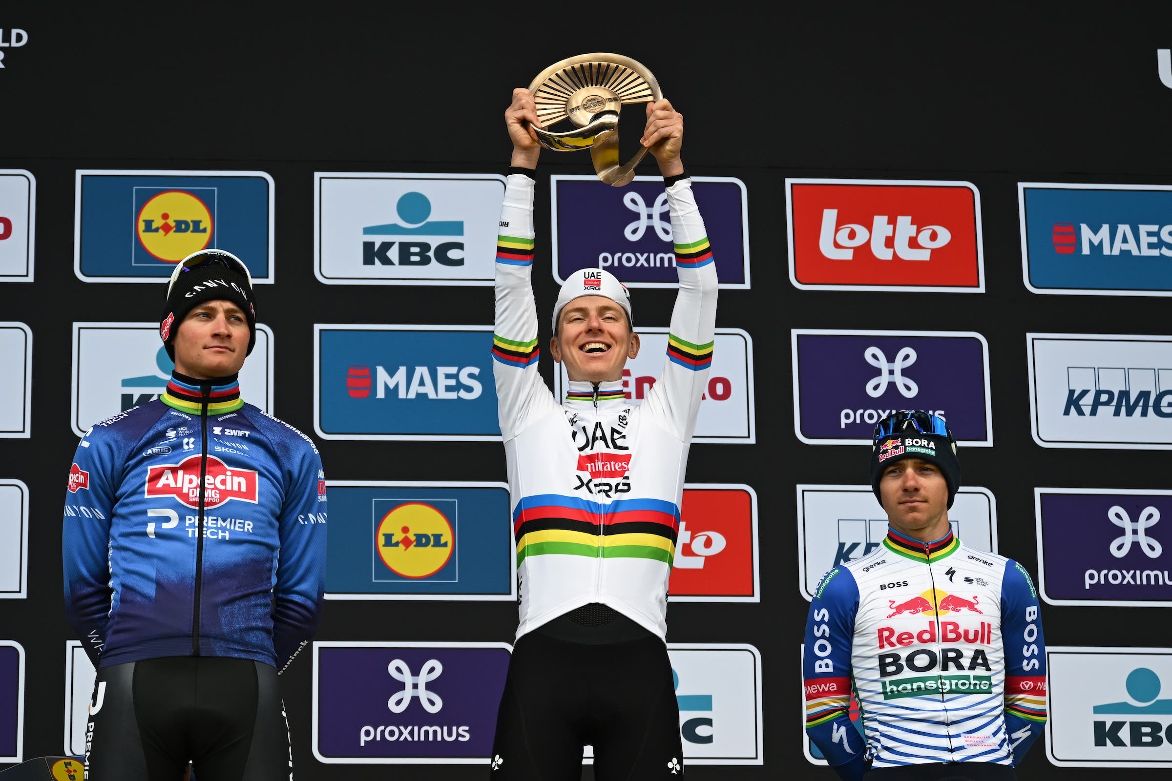 Tadej Pogačar celebrates his Tour of Flanders win ahead of Mathieu van der Poel and Remco Evenepoel (Photo: Luc Claessen/Getty Images)