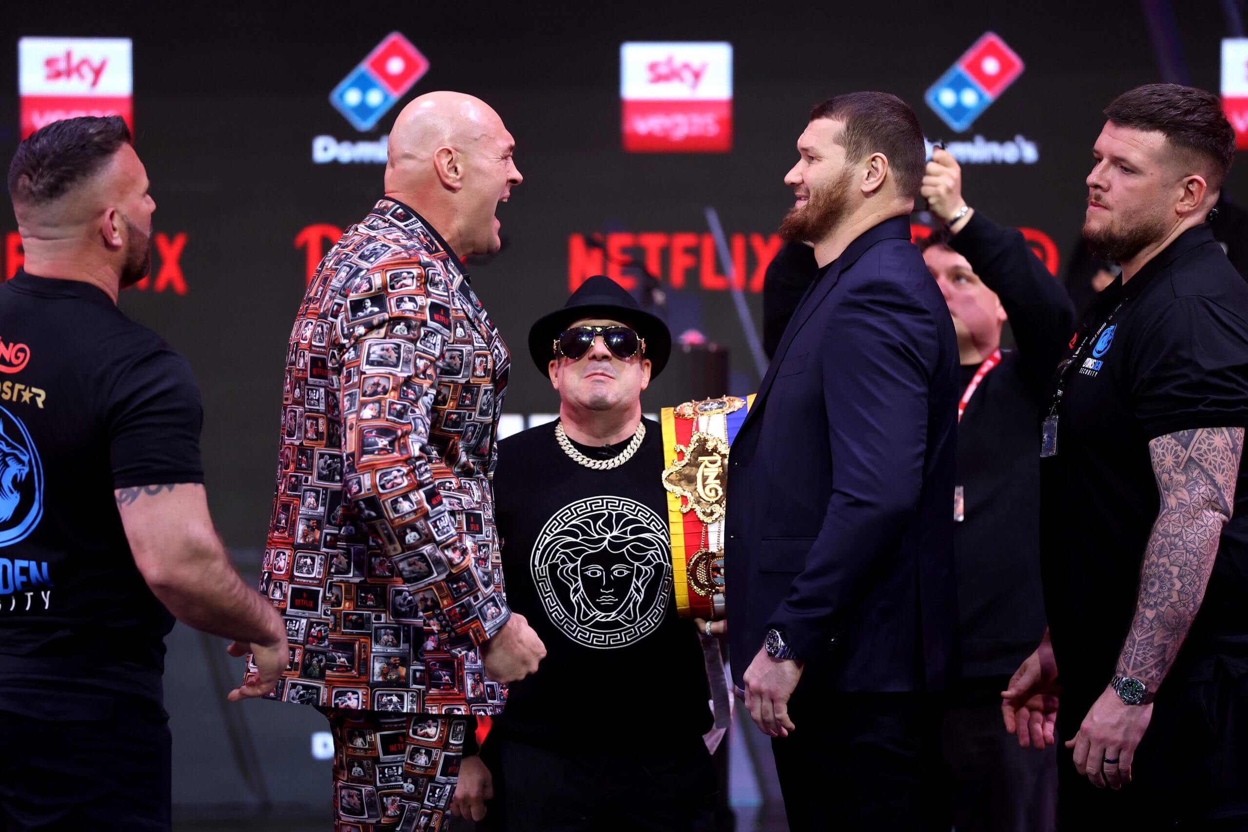 Tyson Fury shouts at opponent Arslanbek Makhmudov during a press conference face-off