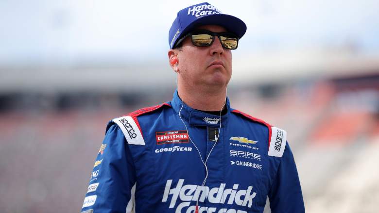 Kyle Busch walks on the grid during NASCAR Craftsman Truck Series qualifying at Bristol Motor Speedway