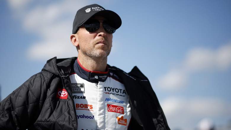 Denny Hamlin looks on during NASCAR Cup Series qualifying at Kansas Speedway
