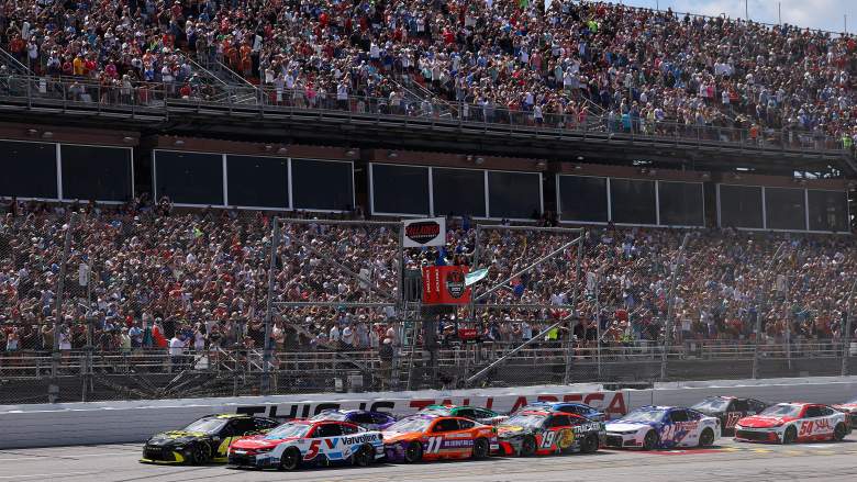 NASCAR Cup Series cars racing in tight pack at Talladega Superspeedway