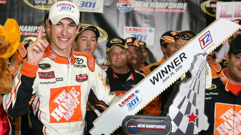 Joey Logano celebrates after winning the NASCAR Cup Series race at New Hampshire Motor Speedway in 2009 as the youngest winner in series history
