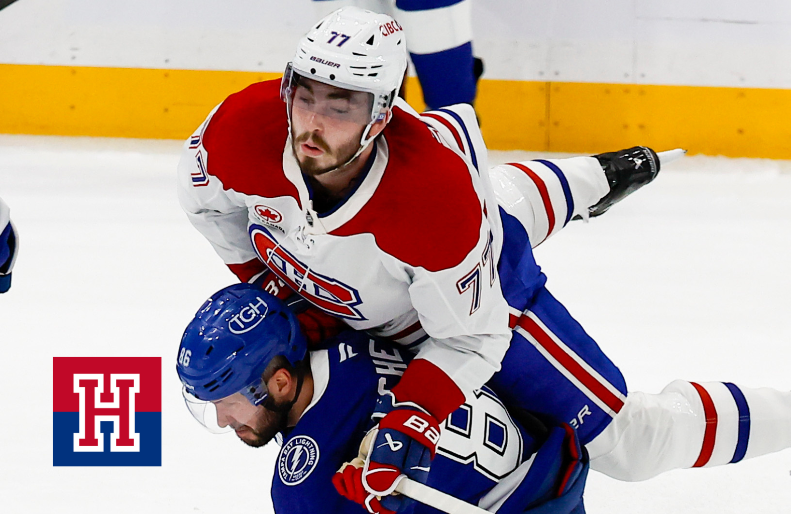 Montréal Canadiens center Kirby Dach (77) flies off the back of Tampa Bay Lightning right wing Nikita Kucherov (86) in the first period during game two of round one of the Stanley Cup Playoffs on Tuesday, April 21, 2026 in Tampa.