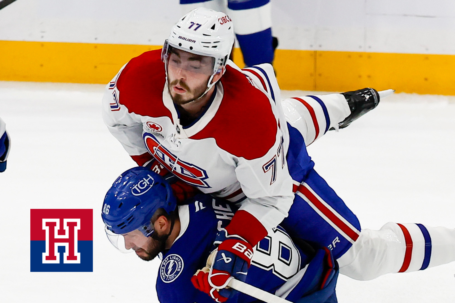 Montréal Canadiens center Kirby Dach (77) flies off the back of Tampa Bay Lightning right wing Nikita Kucherov (86) in the first period during game two of round one of the Stanley Cup Playoffs on Tuesday, April 21, 2026 in Tampa.