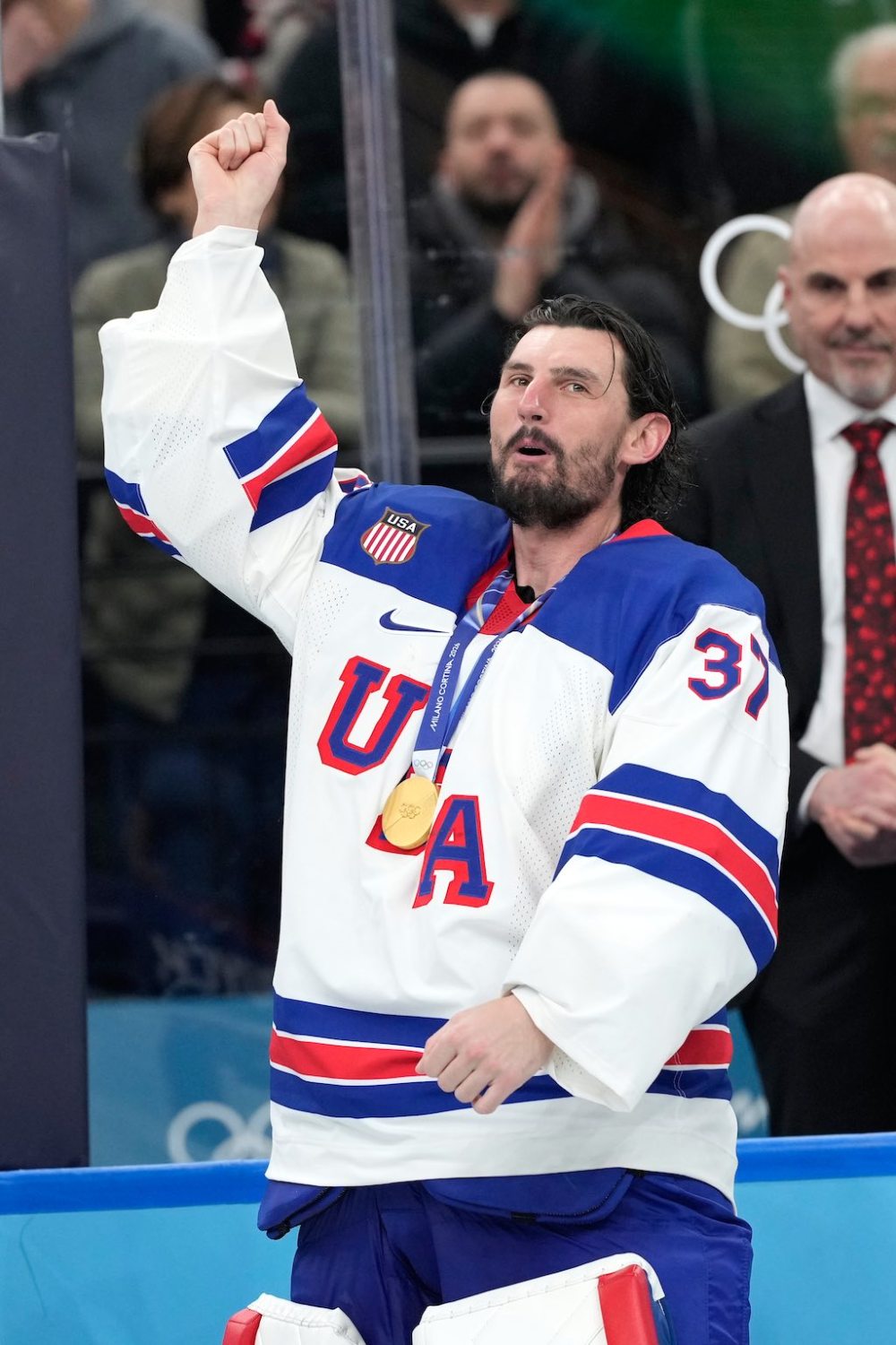 Hassan Ammar / THE ASSOCIATED PRESS FILES
Hellebuyck celebrates his Gold Medal win at the Olympics in February.