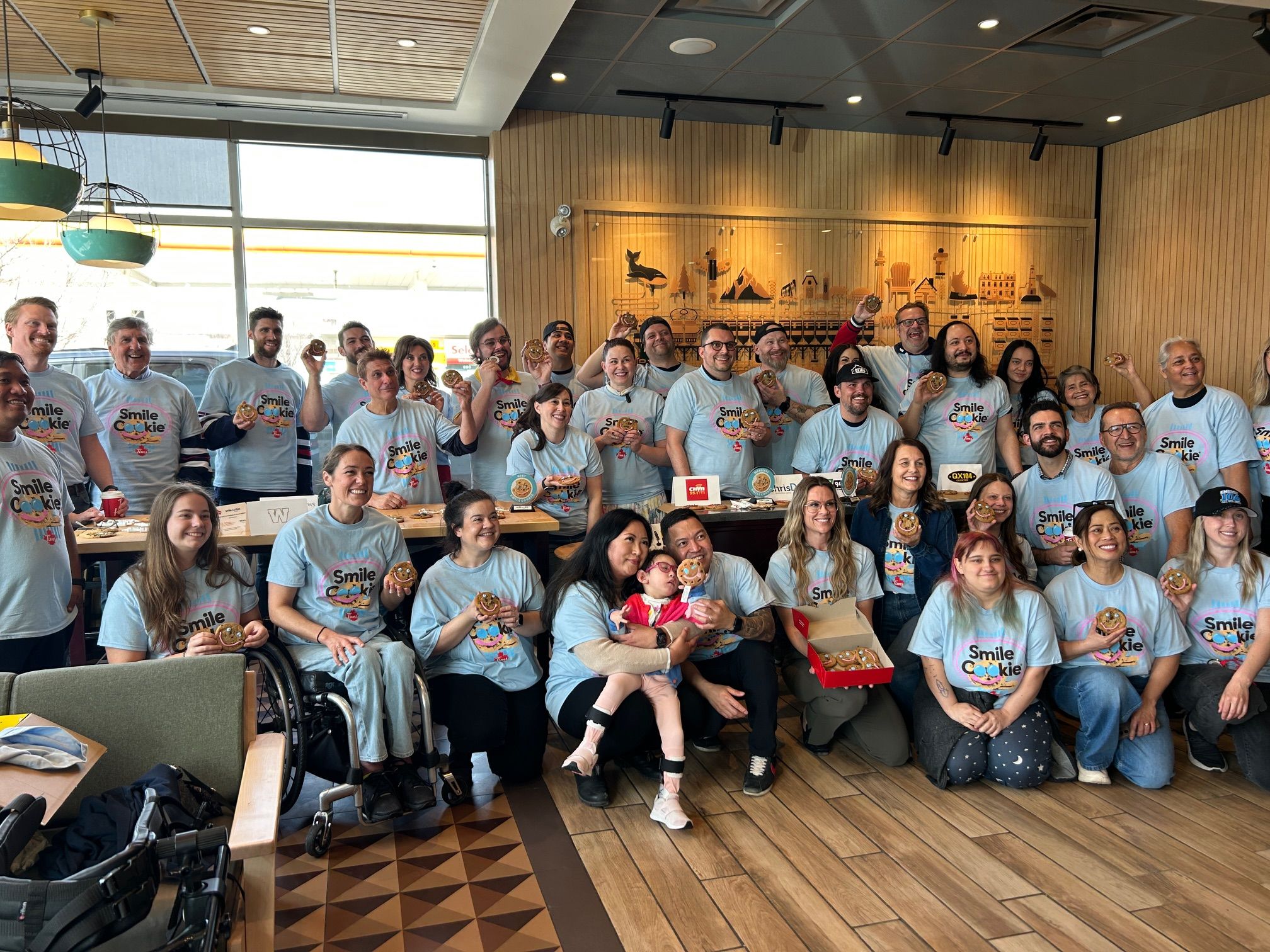 All the radio and TV hosts, ambassadors, and sports personalities that came out for the cookie decorating competition in support of Tim Hortons smile cookie campaign. (Lianna Peters/PNN)