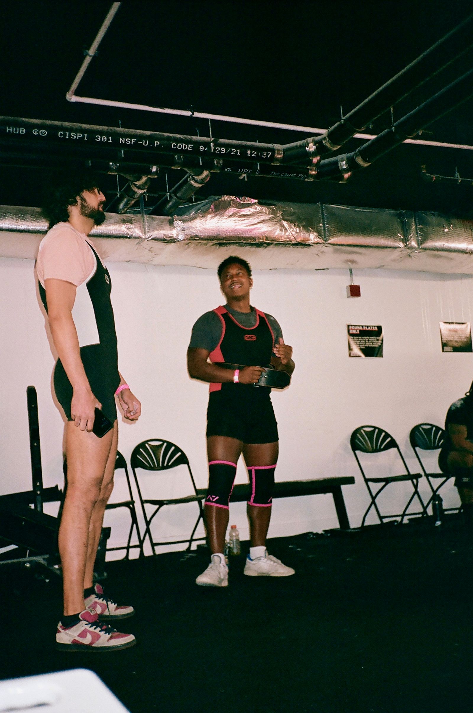 Image may contain Clothing Shorts Person Adult Footwear Shoe Chair Furniture Face Head Photography and Portrait