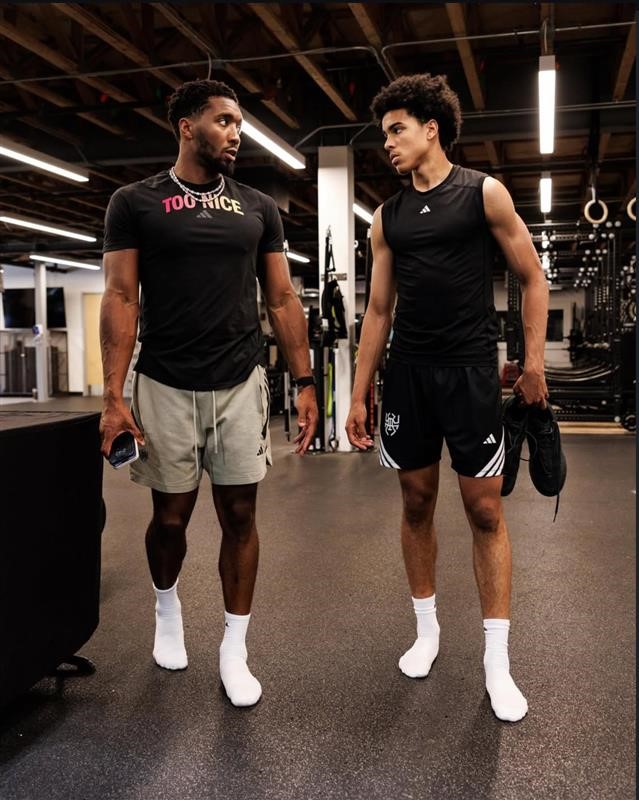 Mikel Brown Jr. with Donovan Mitchell