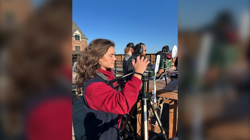 Julia Cameron is pictured recording footage for the Mount Allison Mounties.