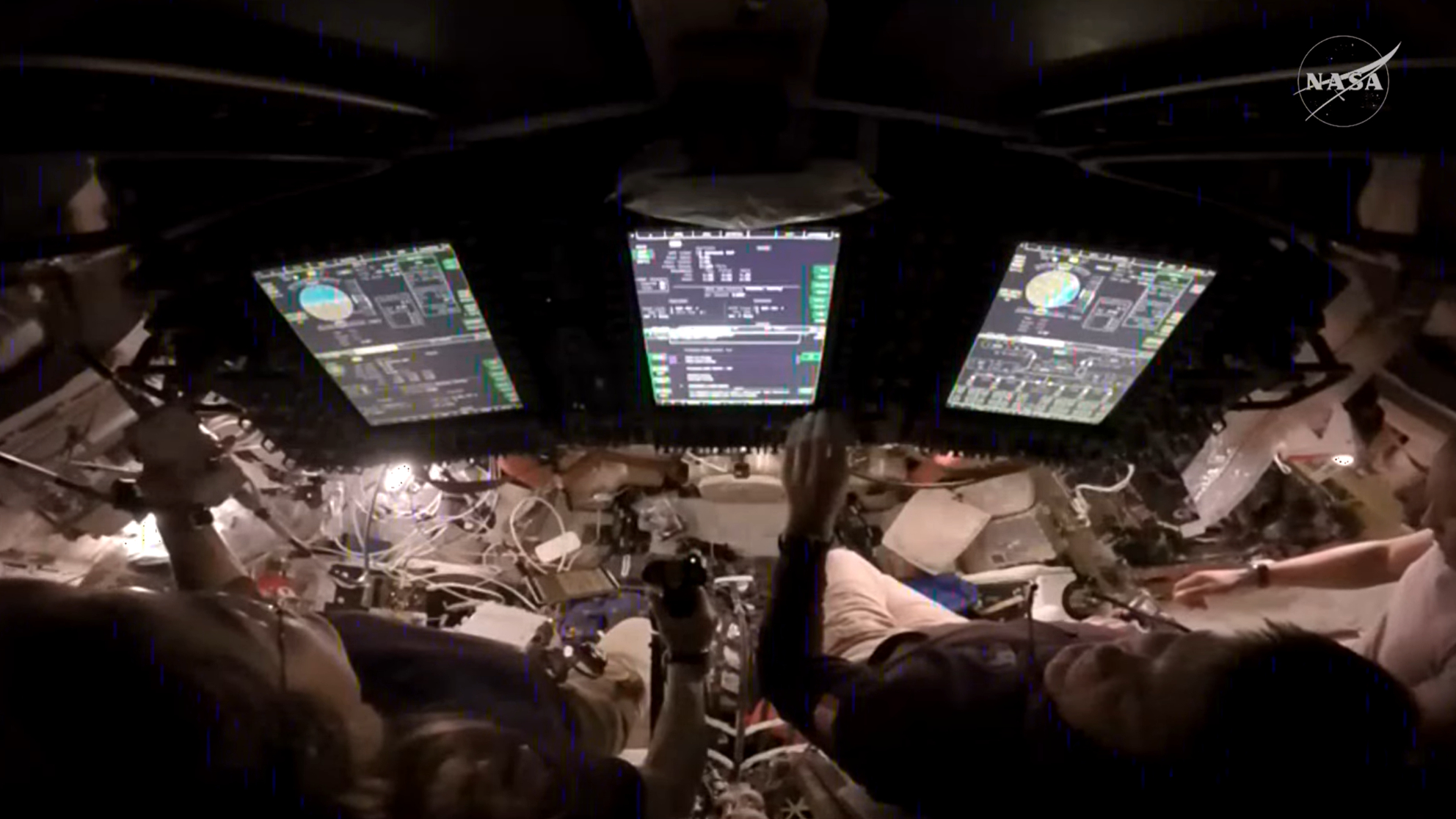 Artemis 2 astronauts Christina Koch and Jeremy Hansen flying Orion on Flight Day 4 (April 4) 2026