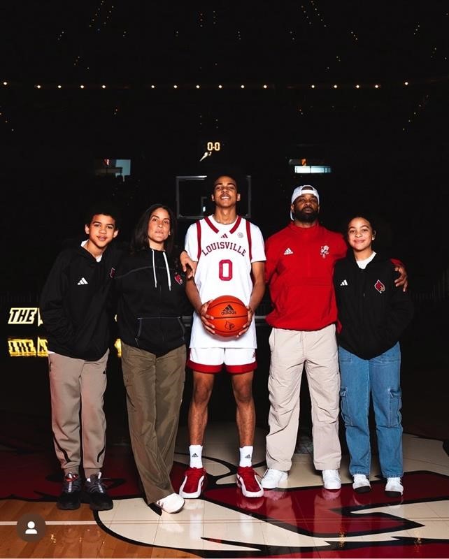 Mikel Brown Jr. (center) with his family