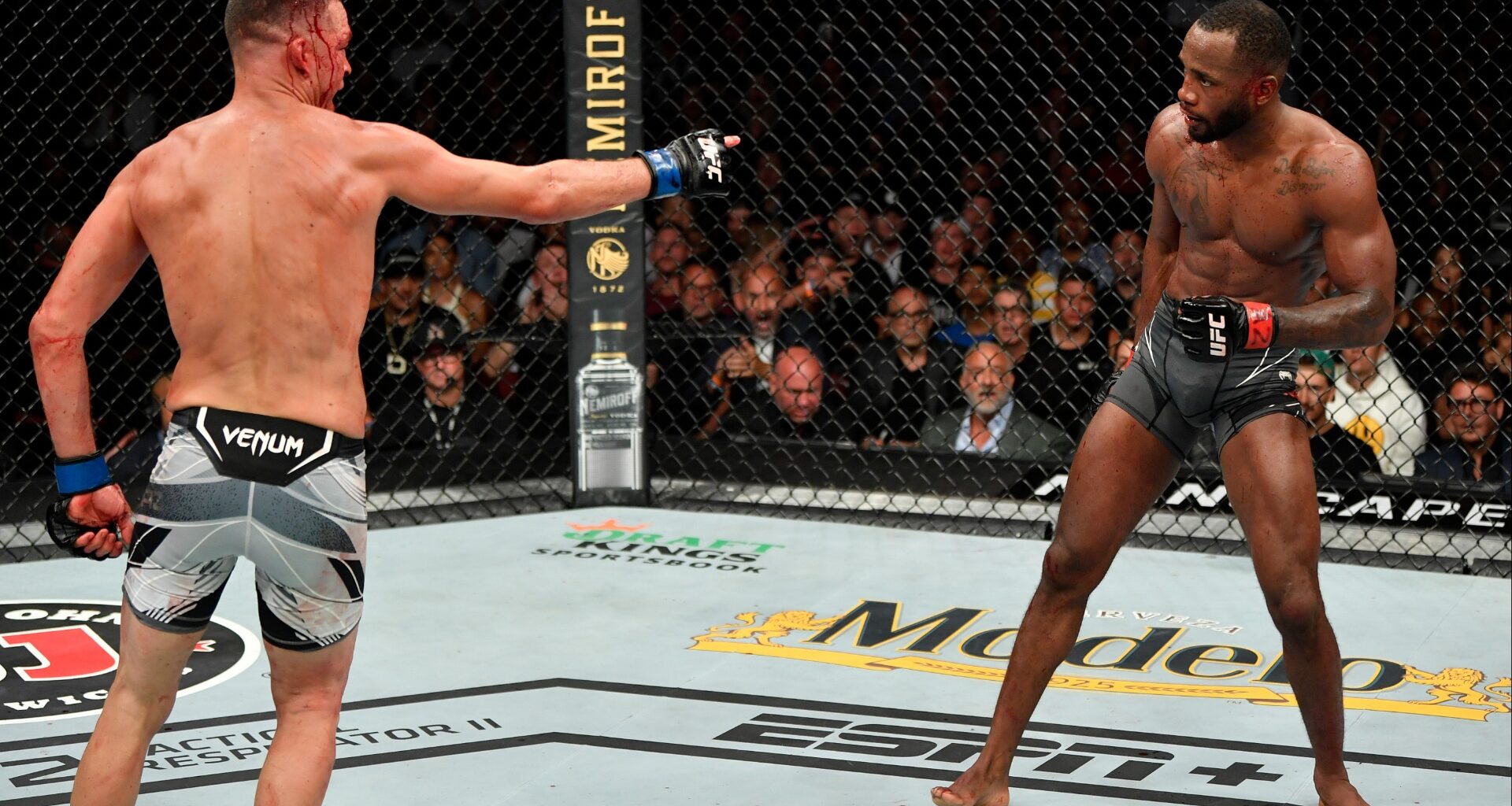 Nate Diaz taunts Leon Edwards during their fight at UFC 263