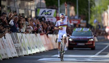 Tadej Pogacar points to the sky after crossing the line first to win the Liege-Bastogne-Liege 2025 cycling Monument.
