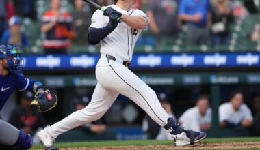 Tigers extend win streak to six by rallying in ninth for rain-delayed victory over Royals