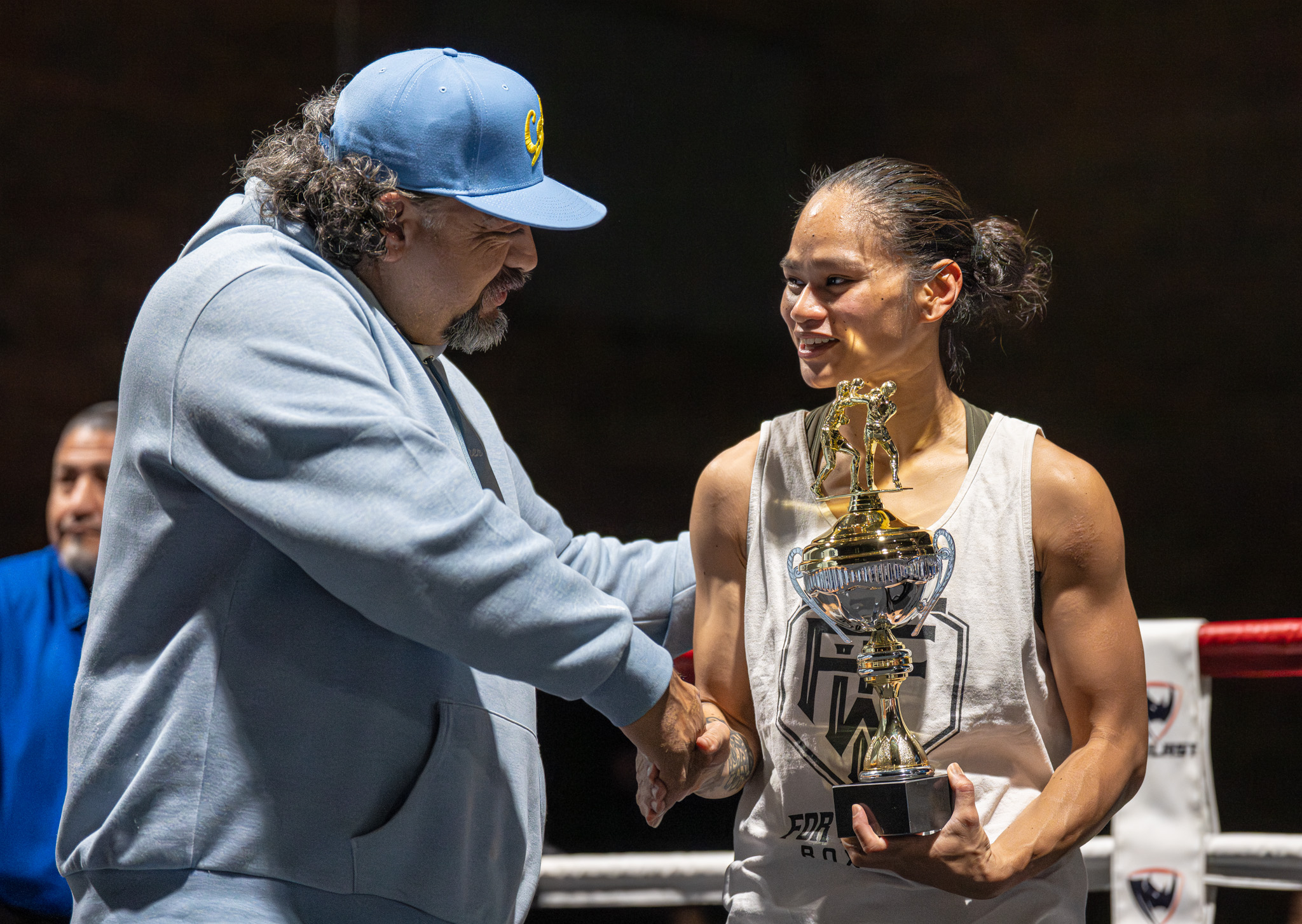 Fausto De La Torre congratulates Jackie Espejo for winning the...