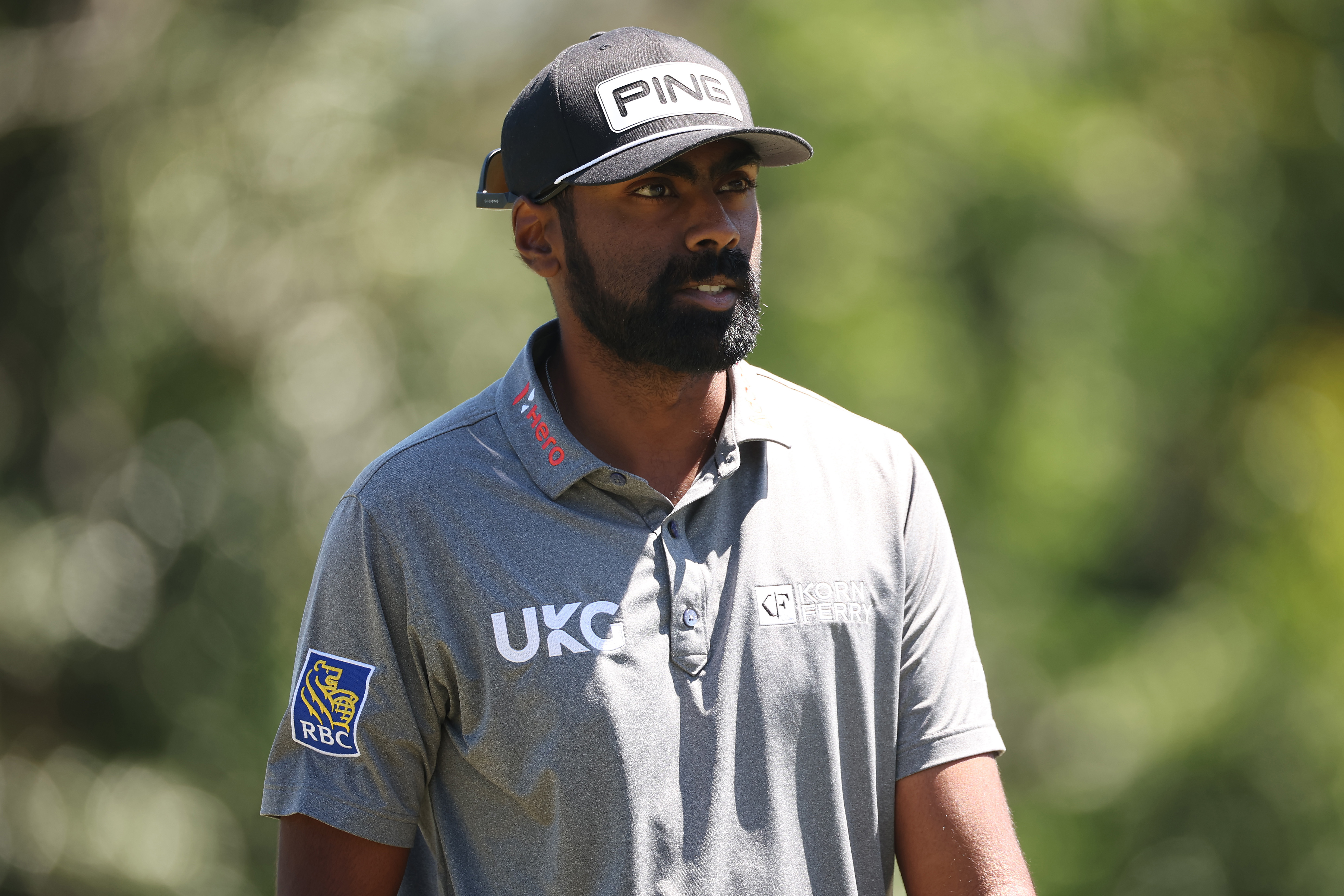 Sahith Theegala walks up to the green