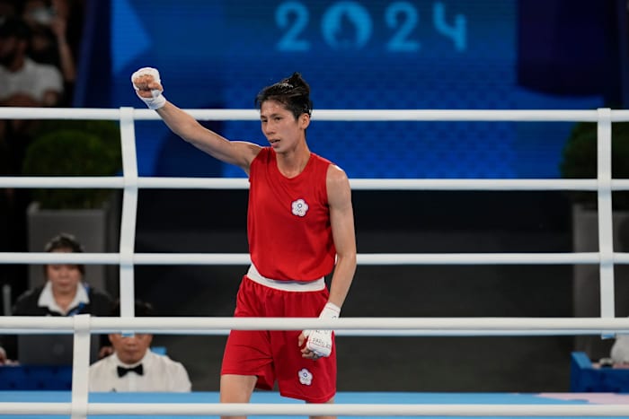 Olympic gold medalist boxer at center of gender controversy advances to Asian semifinals