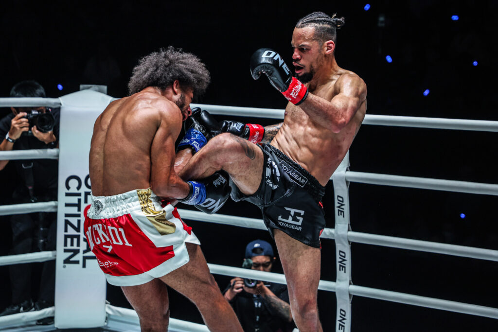 Regian Eersel kicks Alexis Nicolas in the gut during their kickboxing match