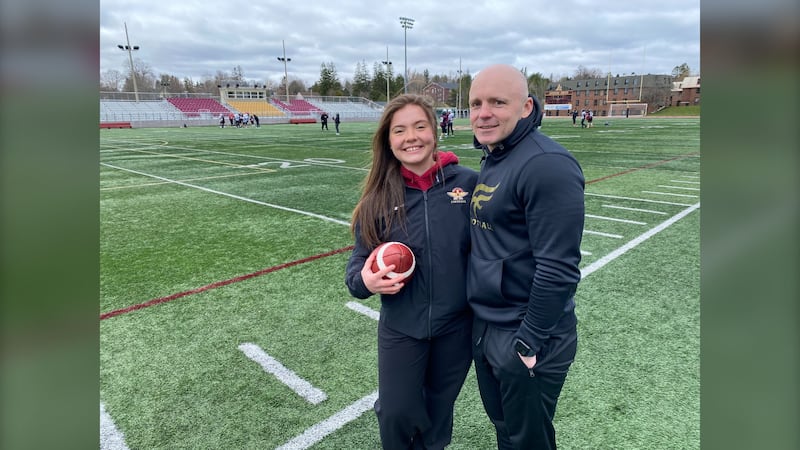 Julia Cameron is pictured with Mount Allison Mounties head coach Scott Brady at alumni field in Sackville, N.B. (Derek Haggett, CTV Atlantic)