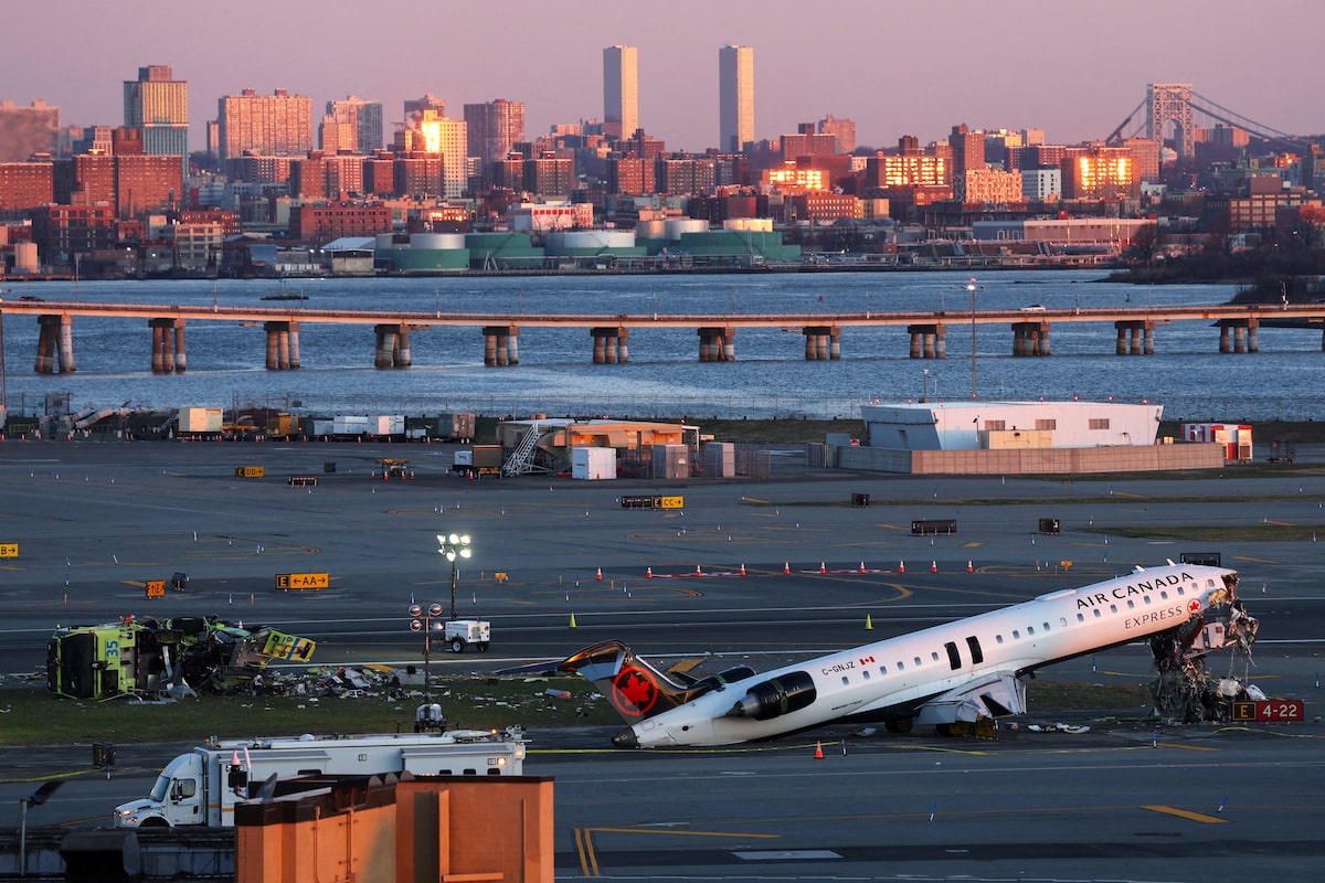 Firefighter heard warning to stop before deadly Air Canada crash at LaGuardia