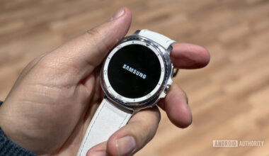 Samsung Galaxy Watch Classic in hand with Samsung logo