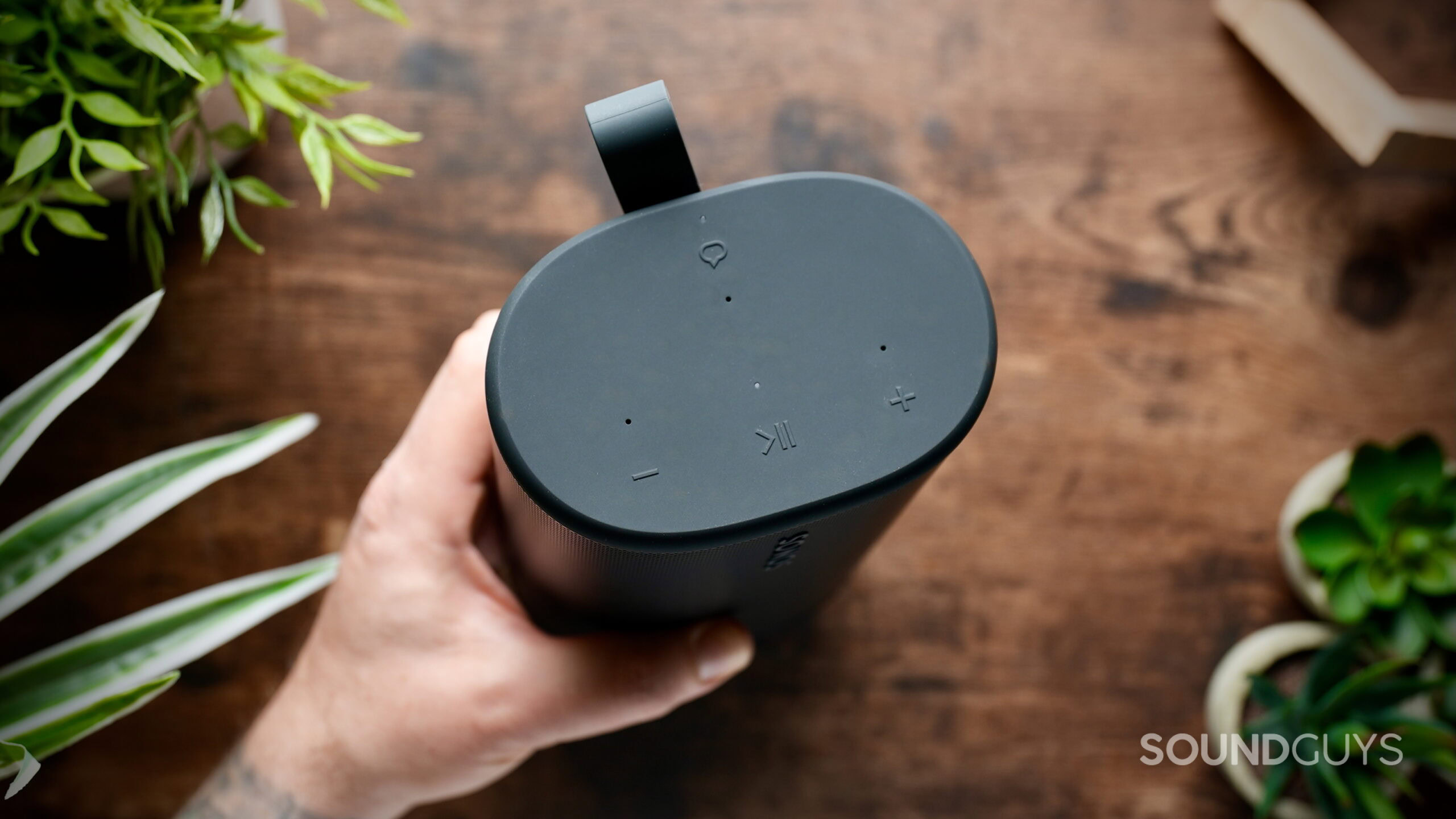 Top view of the Sonos portable speaker showing the touch playback and volume controls.