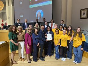 Members of Council and members of MSTSAC present St. Thomas More Catholic Elementary School with the 2025 Wilde Wood School Safety Zone Award.
