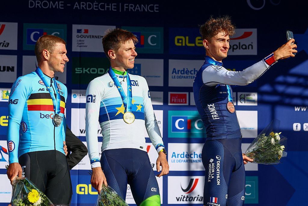 Belgium Remco Evenepoel, Slovenia Tadej Pogacar and France Paul Seixas pictured on the podium after the Men Elite raod race, a 202,5 km from Privas to Guilherand-Granges, at the UEC road European cycling championships, Sunday 05 October 2025, France. The European cycling championships Drome-Ardeche takes place from 1 to 5 October, France. BELGA PHOTO DAVID PINTENS (Photo by DAVID PINTENS / BELGA MAG / Belga via AFP)