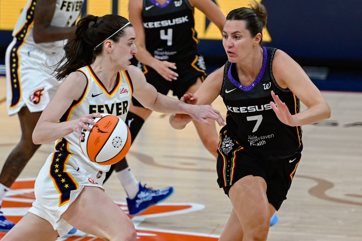 Haley Peters (right) and the Sun will take on Caitlin Clark's Fever for one last season as New England's WNBA entry.
